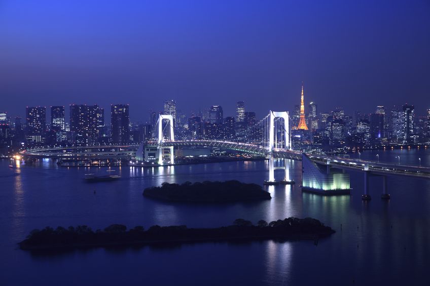 11987292 - view of tokyo downtown at night with rainbow bridge